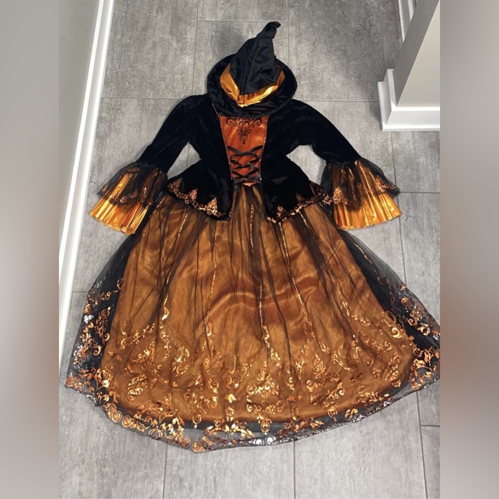 Black and Gold Halloween Witch Costume with Sparkly Details